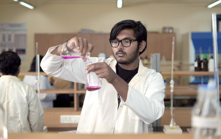 Chemistry lab experiment students NU​