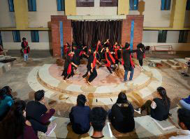 Theatre club students performing at NU​